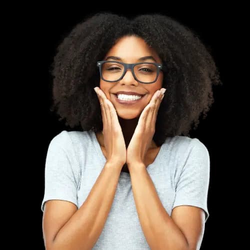 African american woman with black glasses and grey t-shirt smiling happy with her palms con her cheeks